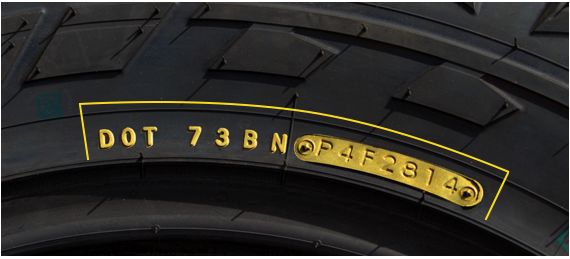 D.O.T number highlighted on the sidewall of a tire